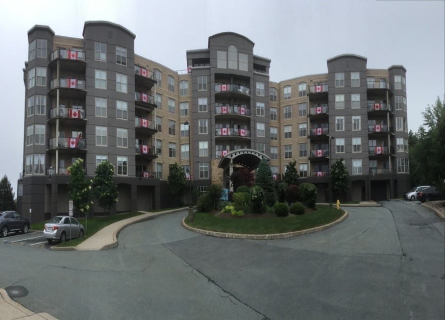 Photo of The Tides building during Canada Day